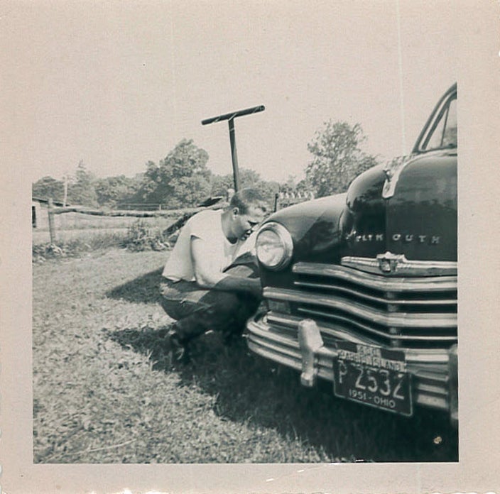 Neil Huffman - Late 50s Working on Car